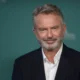 Muere el actor Sam Neill, interpretó al paleontólogo en "Jurassic Park"; "fue repentino", dijo su familia
